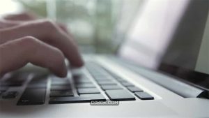 فوتیج مرد در حال تایپ کردن با لپ تاپ Man Typing On Laptop Computer