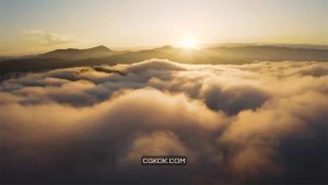 فوتیج طلوع خورشید بر فراز ابرها Sunrise Above Clouds Over Mountains